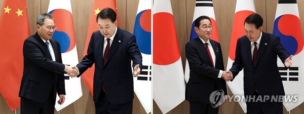 연합뉴스 / 윤석열 대통령이 26일 서울 용산 대통령실에서 리창 중국 국무원 총리(사진 왼쪽), 기시다 후미오 일본 총리와 각각 양자 회담을 하며 악수하고 있다. 