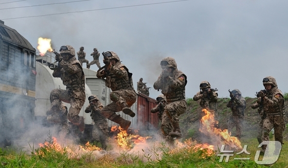 On Friday, marking the 93rd anniversary of the founding of the Korean People\'s Revolutionary Army—an anti-Japanese partisan force—North Korea\'s ruling party newspaper highlighted the role of the People\'s Army in socialist construction, proclaiming that their military has always stood at the forefront of the struggle for the people / Rodong Sinmun