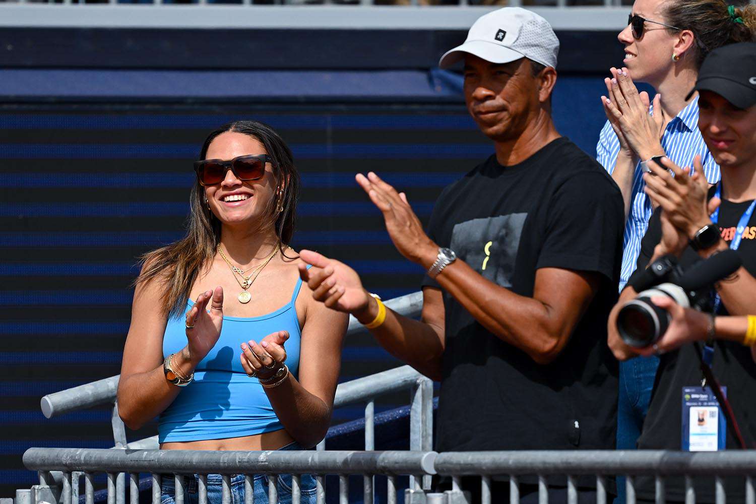 20 April 2025, Bavaria, Munich: Tennis: ATP Tour - Munich, Singles, Men, Final. Zverev (Germany) - Shelton (USA). Trinity Rodman, soccer player and girlfriend of Ben Shelton, and Bryan Shelton, father of Ben Shelton, watch the award ceremony.
