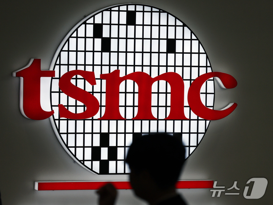 A signboard of Taiwan\'s TSMC is displayed at the 26th Semiconductor Exhibition (SEDEX) at COEX in Seoul, South Korea, on October 23, 2024 / News1