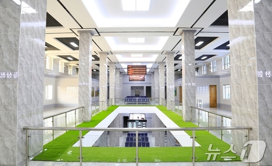 The Workers\' Party\'s official newspaper, Rodong Sinmun, reported on Thursday that a ceremony to mark the completion of the rebuilt Tumen River Station was held on Wednesday. / Rodong Sinmun