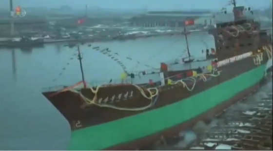 The 14,000-ton Chol San Bong Chong Hyon Ho is seen being side-loaded at the Cheongjin Shipyard in North Korea in 1985 / Screenshot from Korean Central Television