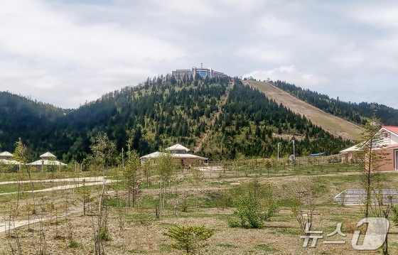 Volcanic features of the Paektu Mountain area, newly designated as a UNESCO Global Geopark, include Ganbaeksan, Beigaebong, Soyeonjibong Small Volcano, and Mudubong Volcano. / Rodong Sinmun