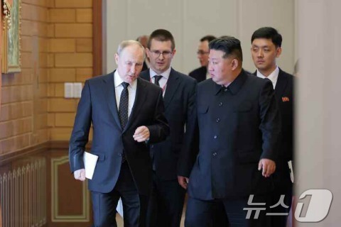 Russian President Vladimir Putin and North Korean Workers\' Party General Secretary Kim Jong-un meeting in Pyongyang last year June / Rodong Sinmun