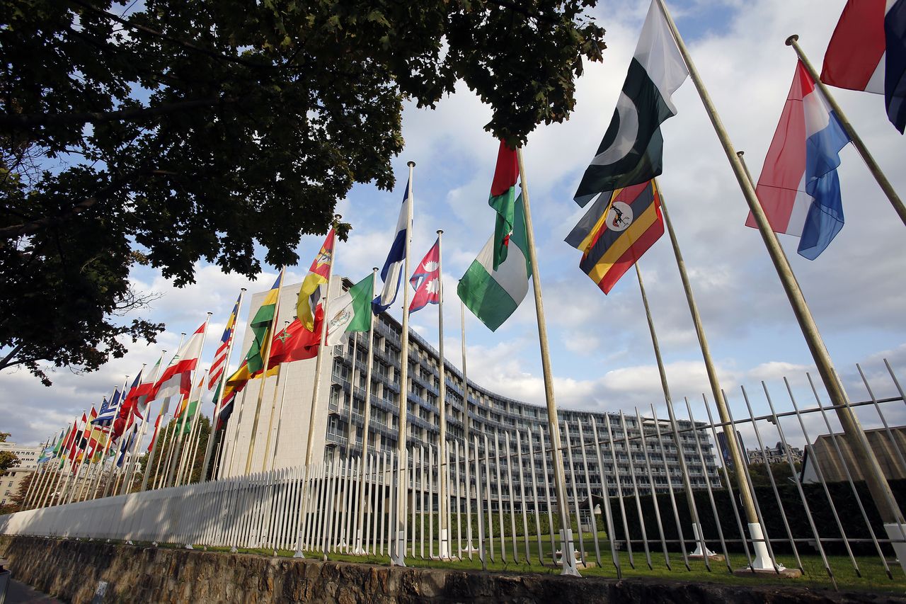 Flags from several countries float in front of the headquarters of the United Nations Educational, Scientific and Cultural Organization (UNESCO) on October 11, 2017 in Paris, France. (Getty Images)