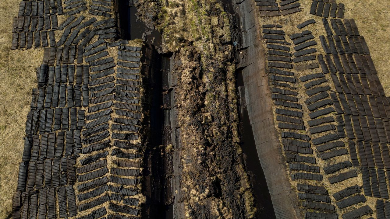A drone view shows turf from Derryrush bog left out to dry after being harvested from the blanket bog in Derryrush, Ireland, April 22, 2024. Reuters-Yonhap