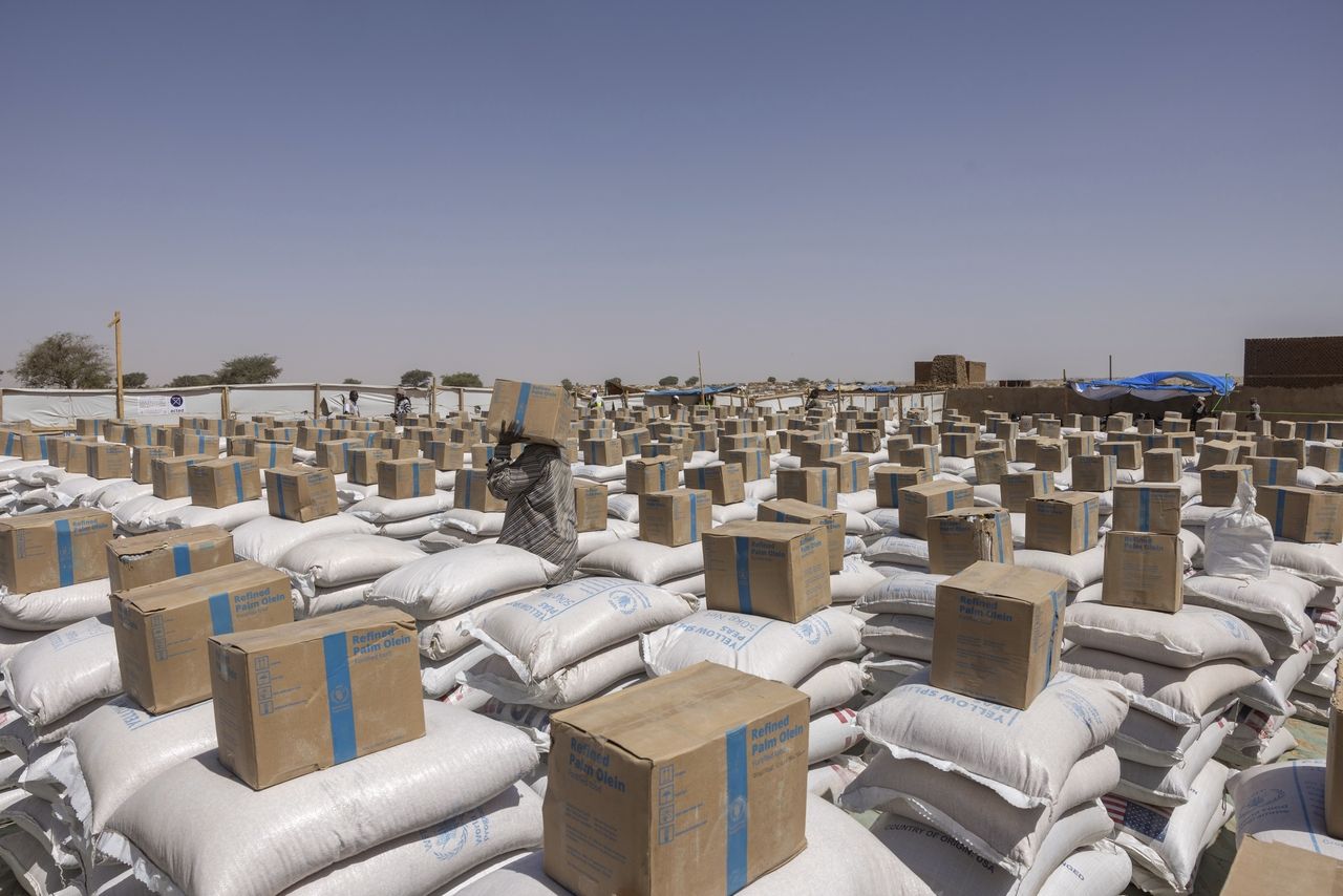 World Food Program supplies wait for distribution in Adre, Chad, May 8. (AP-Yonhap)]