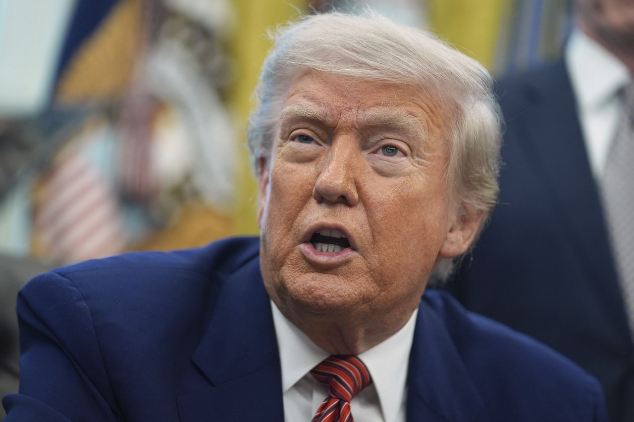 In this file photo, US President Donald Trump speaks to reporters in the Oval Office of the White House on May 23 this year. (AP-Yonhap)]