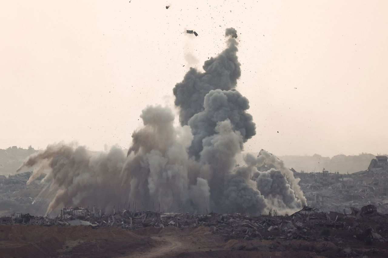 Smoke rises after an explosion in Gaza, as seen from the Israeli side of the Israel-Gaza border, July 20. (Reuters-Yonhap)]