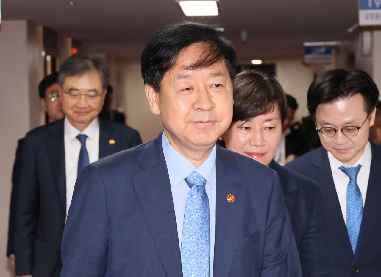 Finance Minister Koo Yun-cheol talks to reporters at the government complex in Seoul on Tuesday. (Yonhap)]