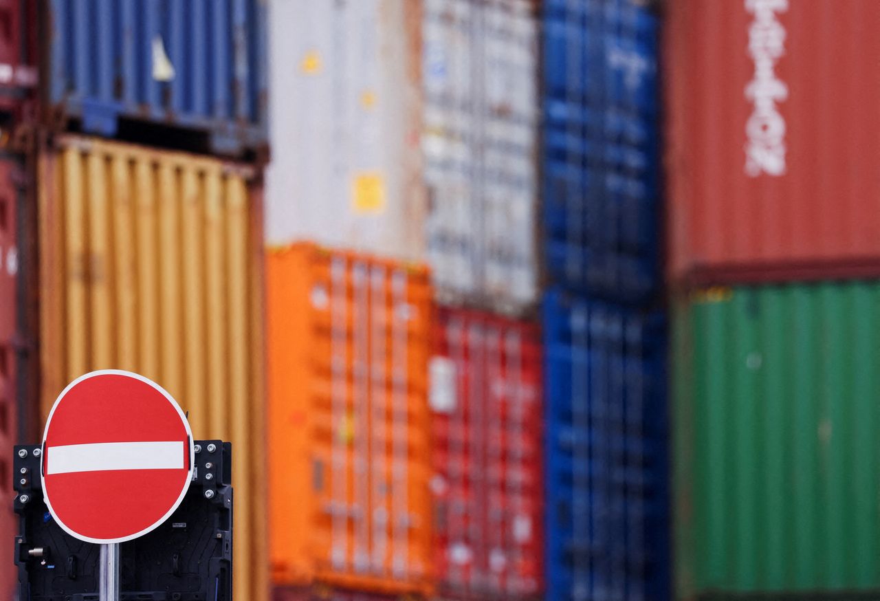 Containers are stacked behind a no entry sign in the harbor of Duisburg, Germany, July 14. Reuters-Yonhap]