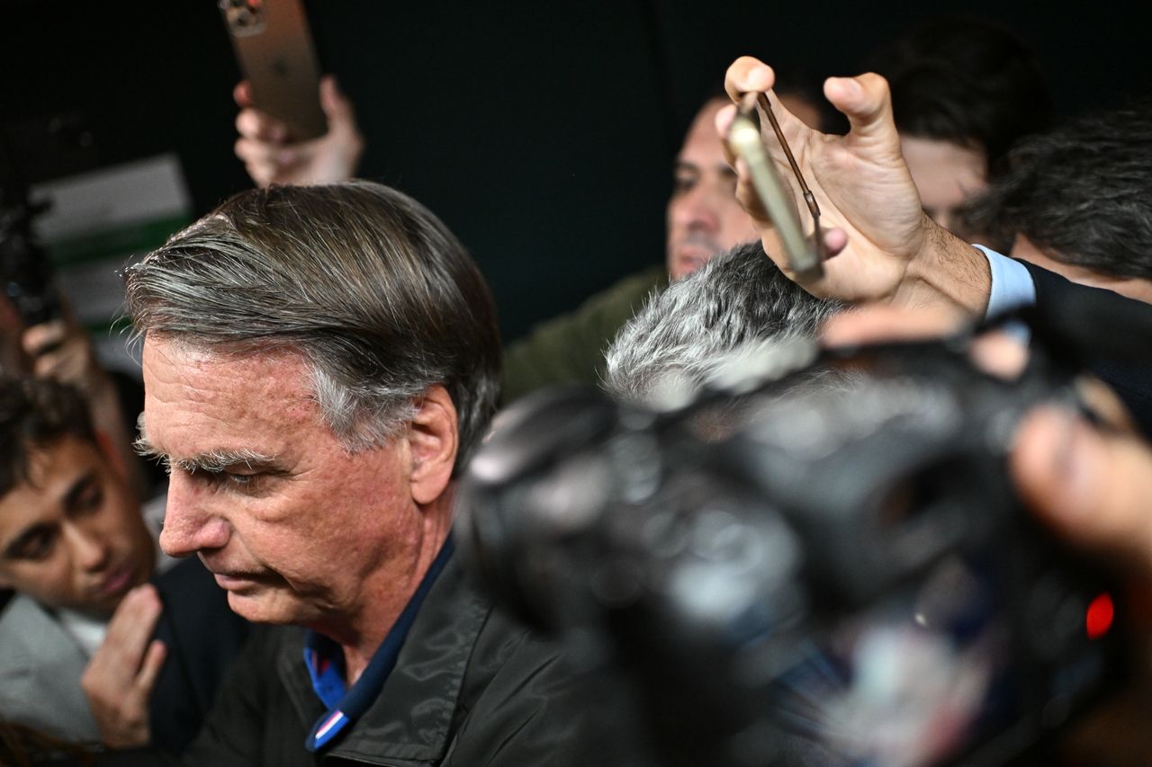 Former Brazilian President Jair Bolsonaro walks out of a meeting with opposition congress members at the National Congress in Brasilia, Brazil, Monday. (EPA-Yonhap)]
