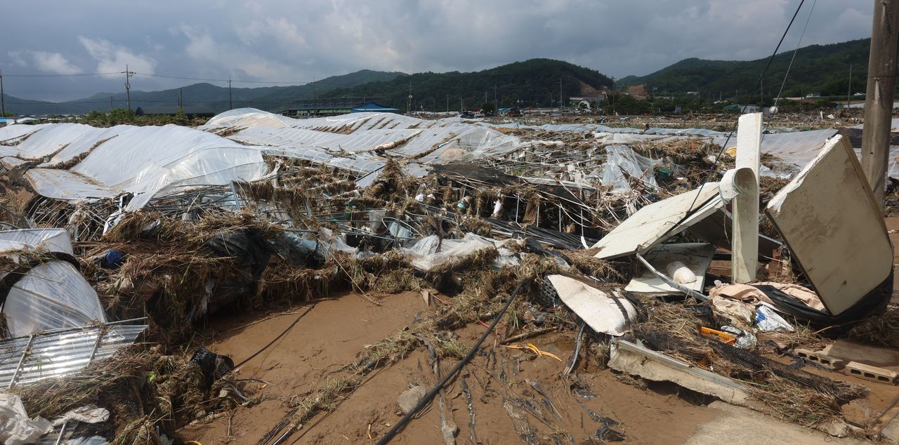 Greenhouses in Sancheong, South Gyeongsang Province, destroyed by the recent heavy rain are seen in this photo taken on Monday. (Yonhap)]