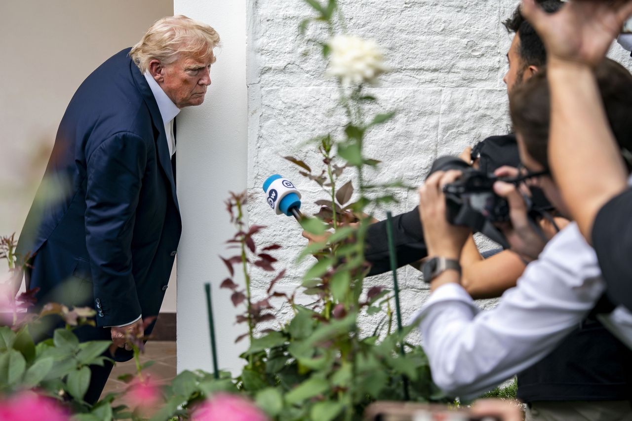 President Donald Trump stops to speak to reporters near the Rose Garden of the White House in Washington, DC on Tuesday. (UPI via Yonhap)]