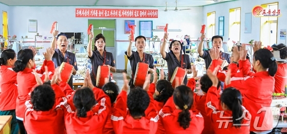 On Wednesday, Rodong Sinmun, the official newspaper of the Workers\' Party of Korea, reported that propaganda team members in Sinuiju are mobilizing the masses to implement the party\'s decisions through powerful propaganda and agitation activities / Rodong Sinmun