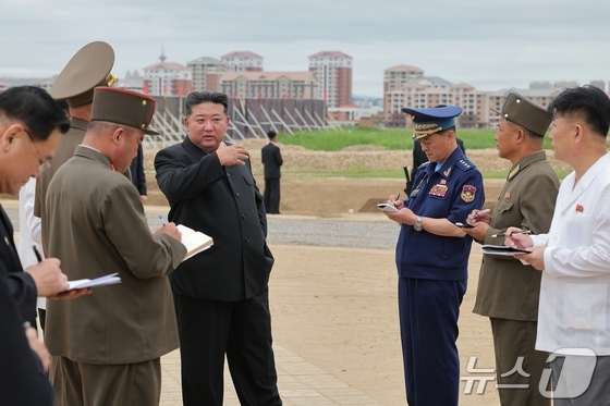 On August 2, the Rodong Sinmun, the official newspaper of the Workers\' Party of Korea, reported that Kim Jong Un visited the construction site of the Wihwa Island Greenhouse Complex and the permanent flood control embankment construction site in the island area of Sinuiju City and Uiju County on August 1 / Rodong Sinmun