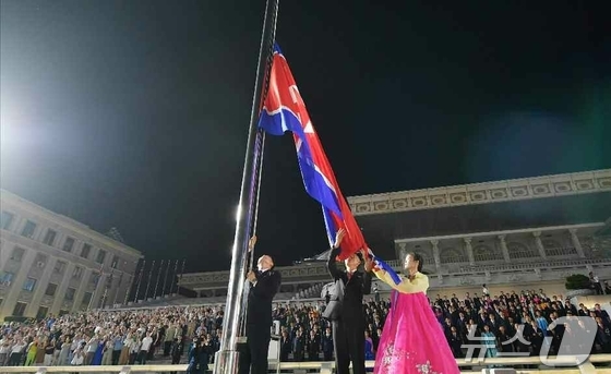 A national flag-raising ceremony was held in Pyongyang on the evening of Monday to mark the 77th anniversary of the regime\'s founding (Tuesday), the North Korean Workers\' Party organ, Rodong Sinmun, reported on Tuesday / Rodong Sinmun