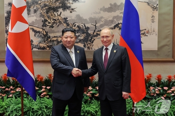 The Rodong Sinmun, the official newspaper of North Korea\'s Workers\' Party, reported on Thursday that Comrade Kim Jong Un met and held talks with Russian President Vladimir Putin at the Diaoyutai State Guesthouse in Beijing on Wednesday afternoon, following Putin\'s participation in the commemorative event marking the 80th anniversary of the victory in the Chinese People\'s War of Resistance Against Japanese Aggression and the World Anti-Fascist War (Victory Day) / Rodong Sinmun