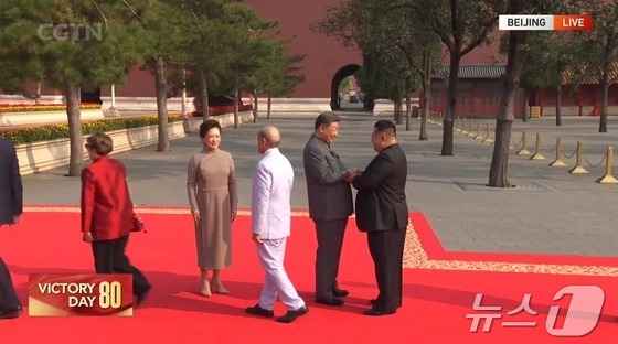 Kim Jong Un, General Secretary of the Workers\' Party of Korea, attended the 80th anniversary Victory Day military parade held at Tiananmen Square in Beijing, China, on Wednesday, shaking hands with Chinese President Xi Jinping. (Capture from China\'s CGTN) 2025.9.3 / News1