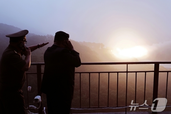 North Korea\'s Workers\' Party official newspaper, the Rodong Sinmun, reported on Tuesday that the General Department of Missiles, under the watchful eye of Party General Secretary Kim Jong Un, conducted a ground-launch test of a Hwasong solid-state engine using carbon fiber composite materials / Rodong Sinmun