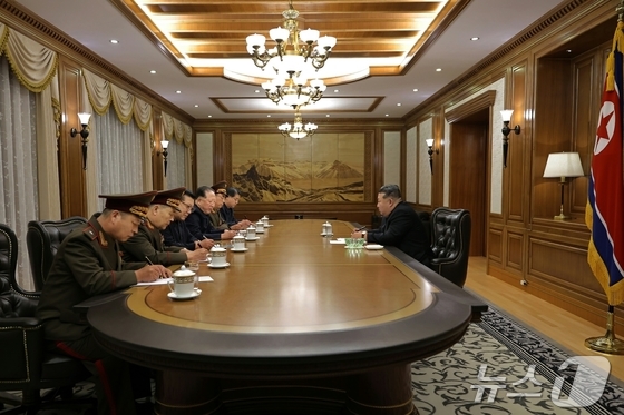  The Rodong Sinmun, the official newspaper of North Korea\'s Workers\' Party, reported on September 27 that General Secretary Kim Jong Un met with scientists and technicians in nuclear-related fields, including the Nuclear Weapons Research Institute, on the previous day and guided an important meeting concerning nuclear material production and nuclear weapons production. Hong Song-mu, First Vice Department Director, participated in the meeting / Rodong Sinmun