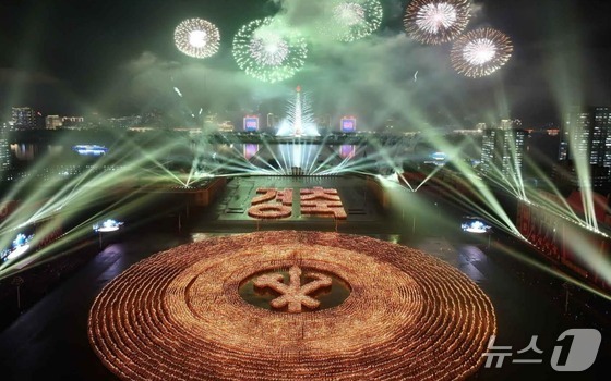  North Korea held a mass rally and torchlight parade at Kim Il-sung Square in Pyongyang on October 11 to celebrate the 80th anniversary of the founding of the Workers\' Party / Rodong Sinmun