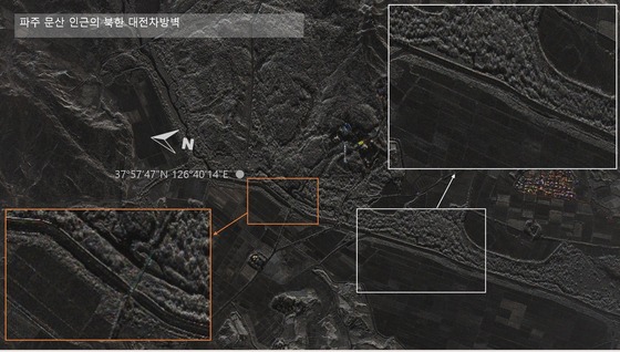 Satellite image showing the installation of an anti-tank barrier along the North Korean border / Provided by Yoo Yong-won, People Power Party member