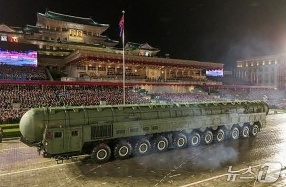  The Rodong Sinmun, the official newspaper of North Korea\'s Workers\' Party, reported on October 11 that a grand military parade celebrating the 80th anniversary of the party\'s founding was held the previous day at Kim Il Sung Square. The photo shows the new intercontinental ballistic missile (ICBM), the Hwasong-20 / Rodong Sinmun
