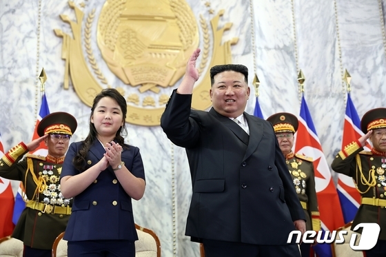  Ju Ae standing beside General Secretary Kim Jong Un at the military parade held on September 8, 2023, to mark the 75th anniversary of the founding of the regime / Rodong Sinmun