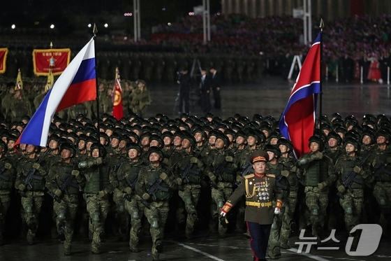  [The Rodong Sinmun, the official newspaper of North Korea\'s Workers\' Party, reported on October 11 that a grand military parade celebrating the 80th anniversary of the party\'s founding was held the previous day, at Kim Il Sung Square in Pyongyang. The new intercontinental ballistic missile (ICBM), the Hwasong-20, was unveiled for the first time that day / Rodong Sinmun]