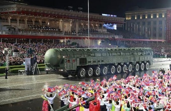  The Rodong Sinmun, the official newspaper of North Korea\'s Workers\' Party, reported on October 11 that a grand military parade celebrating the 80th anniversary of the party\'s founding was held the previous day at Kim Il Sung Square. The photo shows the new intercontinental ballistic missile (ICBM), the Hwasong-20 / Rodong Sinmun
