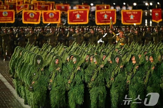  [The Rodong Sinmun, the official newspaper of North Korea\'s Workers\' Party, reported on October 11 that a grand military parade celebrating the 80th anniversary of the party\'s founding was held the previous day, at Kim Il Sung Square in Pyongyang. The new intercontinental ballistic missile (ICBM), the Hwasong-20, was unveiled for the first time that day / Rodong Sinmun]