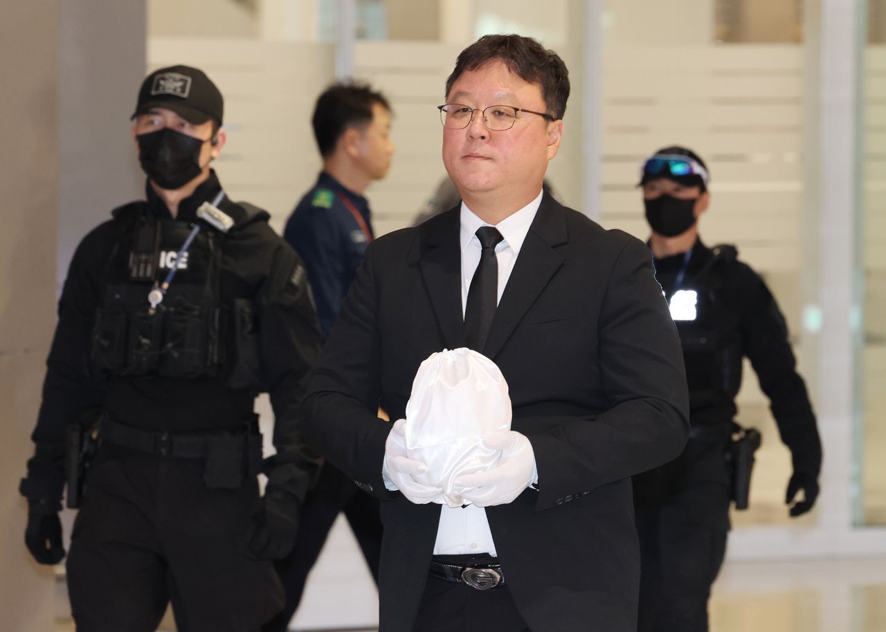 The body of a South Korean university student in his 20s, identified only by his surname Park, who was tortured and killed at a criminal compound in Cambodia, is brought back to South Korea through Incheon International Airport on Tuesday. (Yonhap)