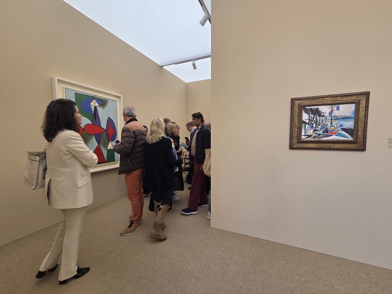 People look at paintings by Pablo Picasso at Nahmad Contemporary's booth at Art Basel Paris 2025 on Wednesday at the Grand Palais in Paris. (Park Yuna/The Korea Herald)