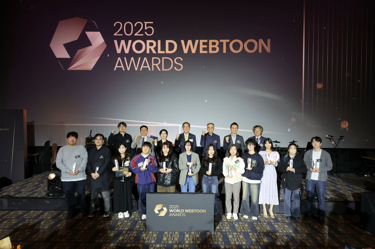 Winners of the 2025 World Webtoon Awards pose during a ceremony on Wednesday at Lotte Cinema World Tower in Seoul. (Ministry of Culture, Sports and Tourism)
