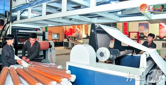 The Rodong Sinmun, the official newspaper of North Korea\'s Workers\' Party, highlighted the Pyongyang Suji Building Materials Factory on Tuesday, stating it is striving to produce high-quality building materials / Rodong Sinmun