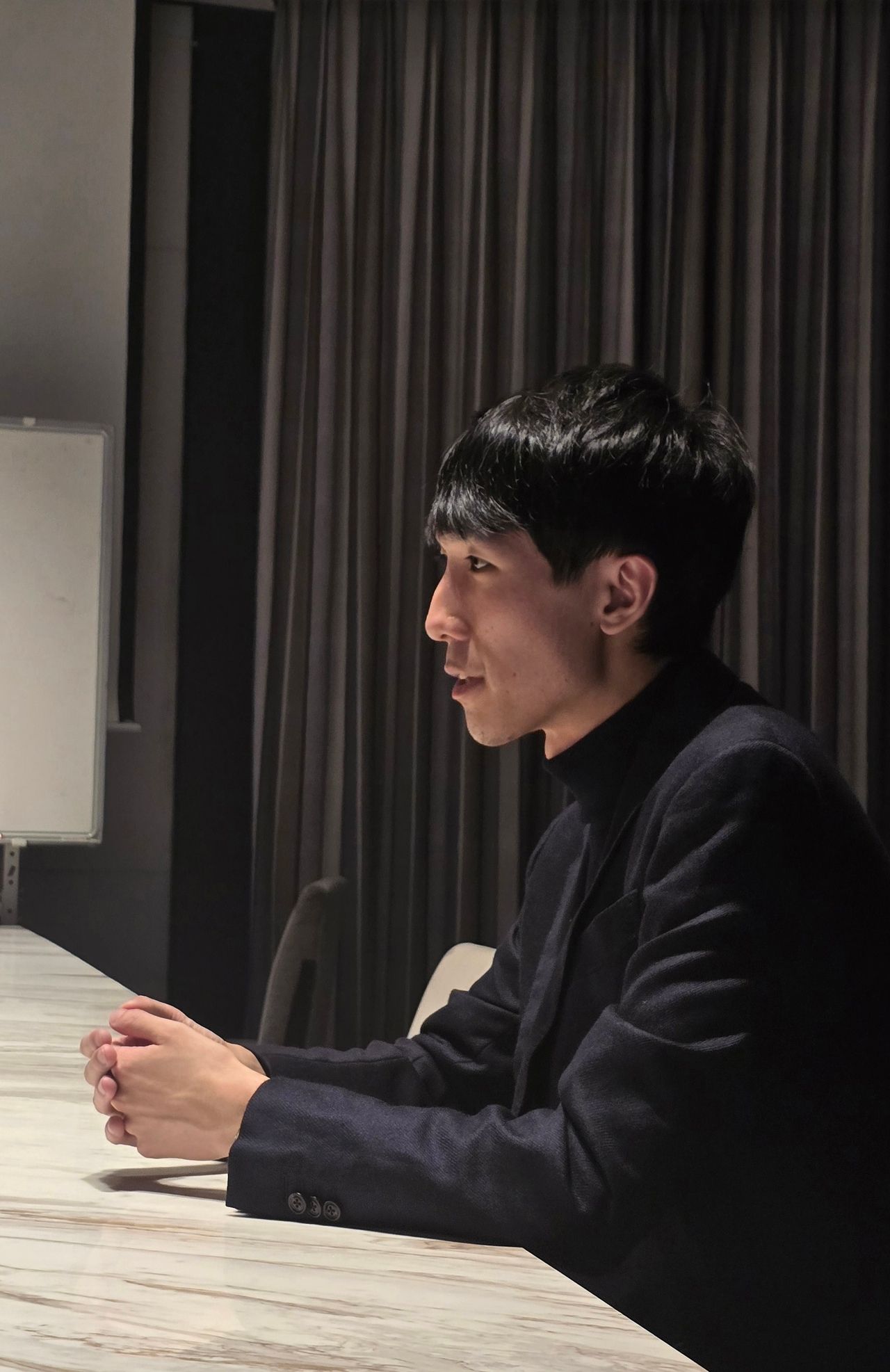 Pianist Eric Lu speaks in an interview with reporters in Seoul on Monday. (Park Ga-young/The Korea Herald)