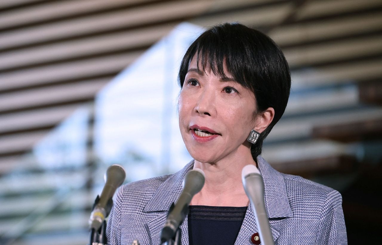 Japan's Prime Minister Sanae Takaichi answers questions from reporters in Tokyo, Tuesday. (AFP-Yonhap)