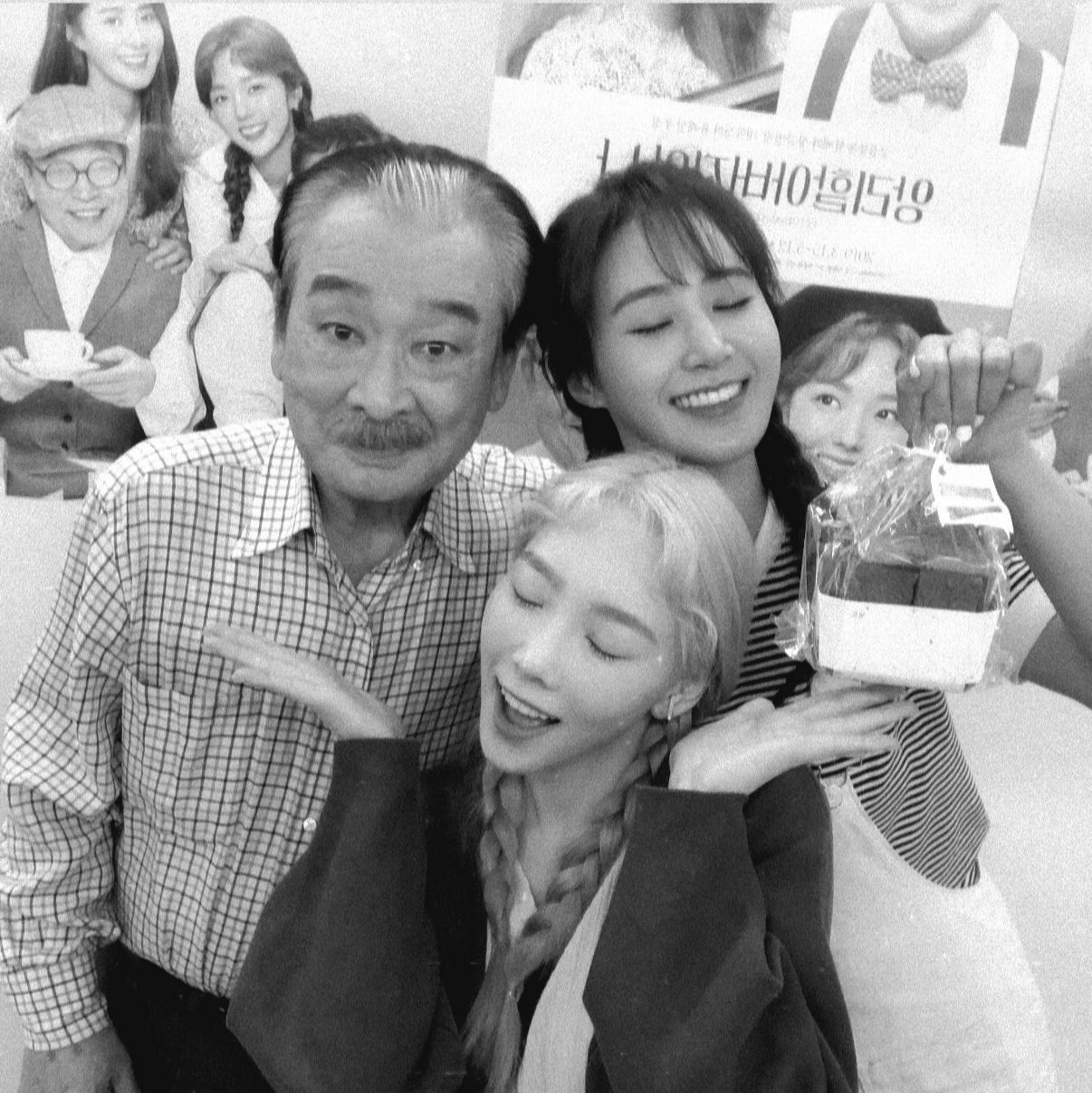 Singer Taeyeon of Girls’ Generation shares a black-and-white photo with Lee Soon-jae (left) and Yuri, reportedly taken after attending a performance of the play 
