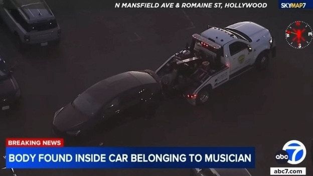 The vehicle belonging to singer d4vd, where a teenage girl\'s body was discovered, is towed from Mansfield Avenue in Hollywood. Credit: abc7 