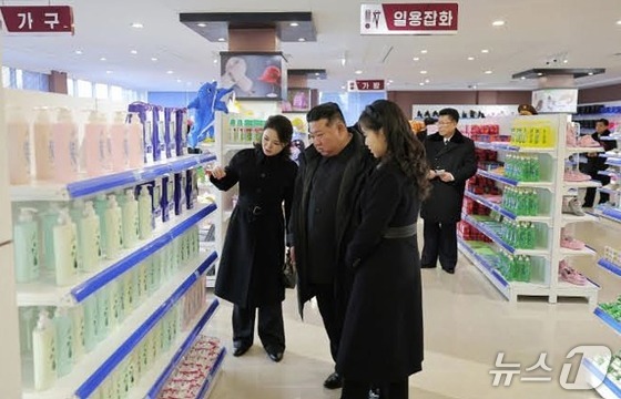 Kim Jong Un, General Secretary of the Workers\' Party of Korea, visited the newly completed local industrial factory in Kangdong County with his wife, Ri Sol-ju, and daughter, Ju Ae / Rodong Sinmun