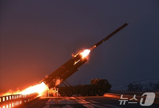 The Rodong Sinmun, the official newspaper of North Korea\'s Workers\' Party, reported on Monday that a long-range strategic cruise missile launch drill was conducted in the waters of the West Sea of Korea on the previous day, adding that Comrade Kim Jong Un observed the strategic cruise missile launch drill / Rodong Sinmun