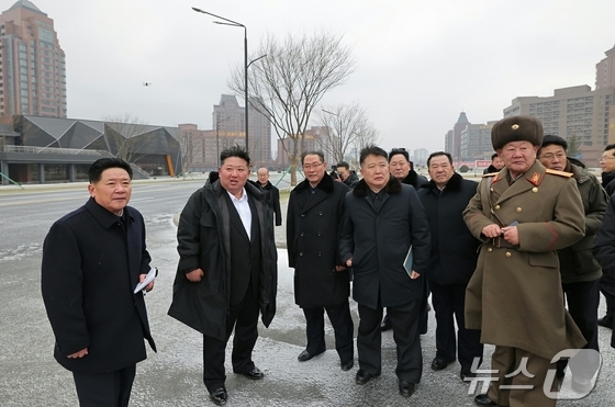  An image of Kim Jong Un, General Secretary of the Workers\' Party of Korea, as reported in the party\'s official newspaper Rodong Sinmun on January 11. The newspaper reported that General Secretary Kim visited the construction site of the fourth phase of the Hwasong District the previous day / Rodong Sinmun