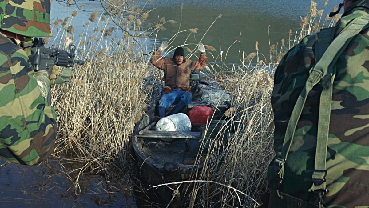  引用： 『網に囚われた男』スチルカット。 / NEW 提供