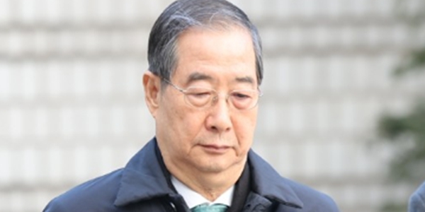 한덕수 전 국무총리가 21일 서울중앙지법에서 열린 1심 선고 공판에 출석하고 있다. ⓒ연합뉴스