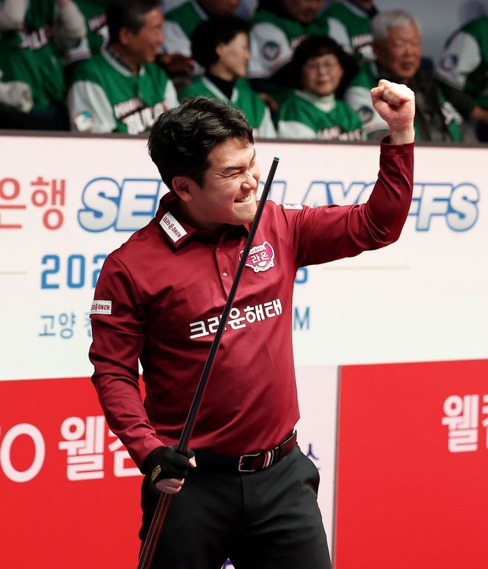 크라운해태 오태준이 7세트 승리 후 환호하고 있다. ⓒ PBA