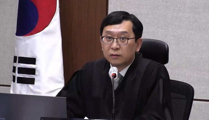 지난 21일 서울중앙지법에서 열린 한덕수 전 국무총리의 내란 중요임무 종사 혐의 1심 선고 공판에서 이진관 부장판사가 발언하고 있다.ⓒ 서울중앙지법 제공.