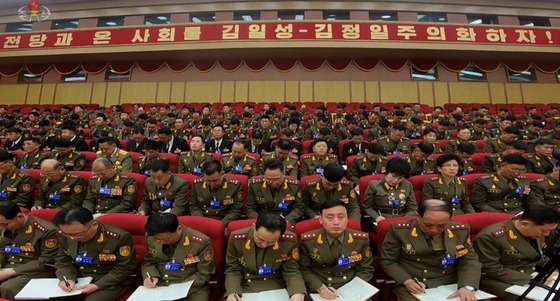 According to footage of the 9th Workers\' Party Congress released by North Korea\'s Korean Central Television on Tuesday, it was confirmed that the observers at the party congress wore blue name tags, unlike the official delegation seated in the front / Captuer from Korean Central Television