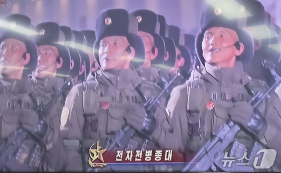 According to a broadcast by Korean Central Television on Thursday, units that were not called out during last October\'s parade commemorating the founding of the Workers\' Party, such as the electronic warfare brigade, appeared in the parade march through Kim Il Sung Square that day / Capture from Korean Central Television