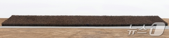 On February 1, Kim Jong Un, General Secretary of the Workers\' Party, attended the completion ceremony of the Sinuiju Greenhouse Complex Farm and took a commemorative photo with the builders / Rodong Sinmun